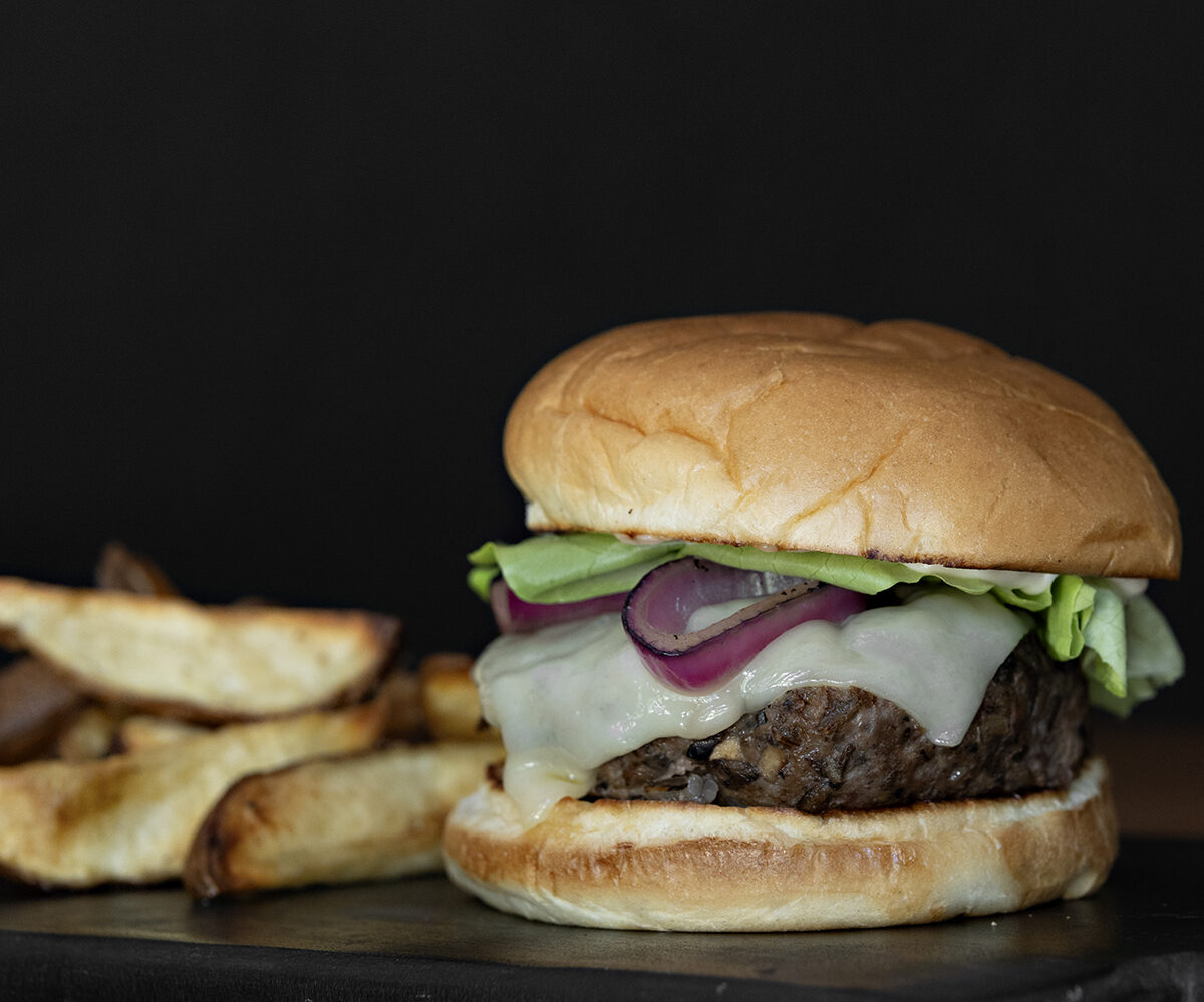 Bison burger with fries plated. Recipe by members of the White Earth 4-H Club