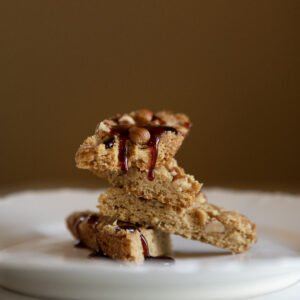 Kernza Maple Shortbread with Elderberry-Honey Glaze and Crushed Hazelnuts